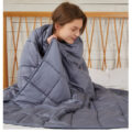 Lightweight cotton weighted blanket for summer sleep and travel use